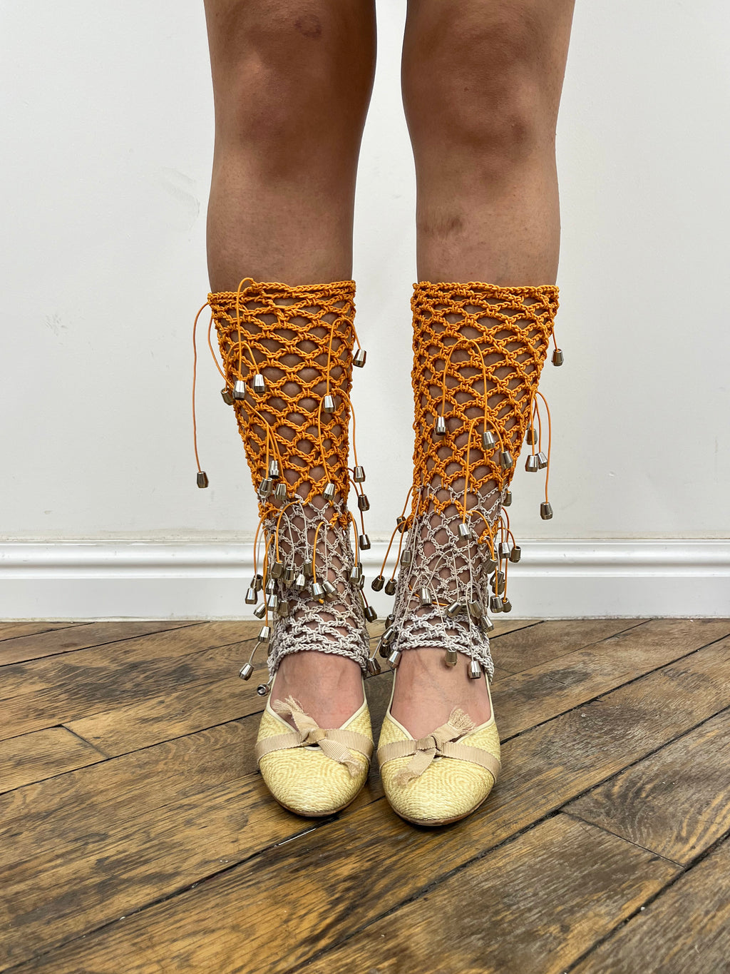 beige and orange crochet elastic stirrups