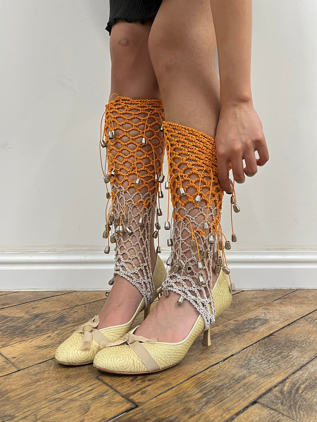 beige and orange crochet elastic stirrups