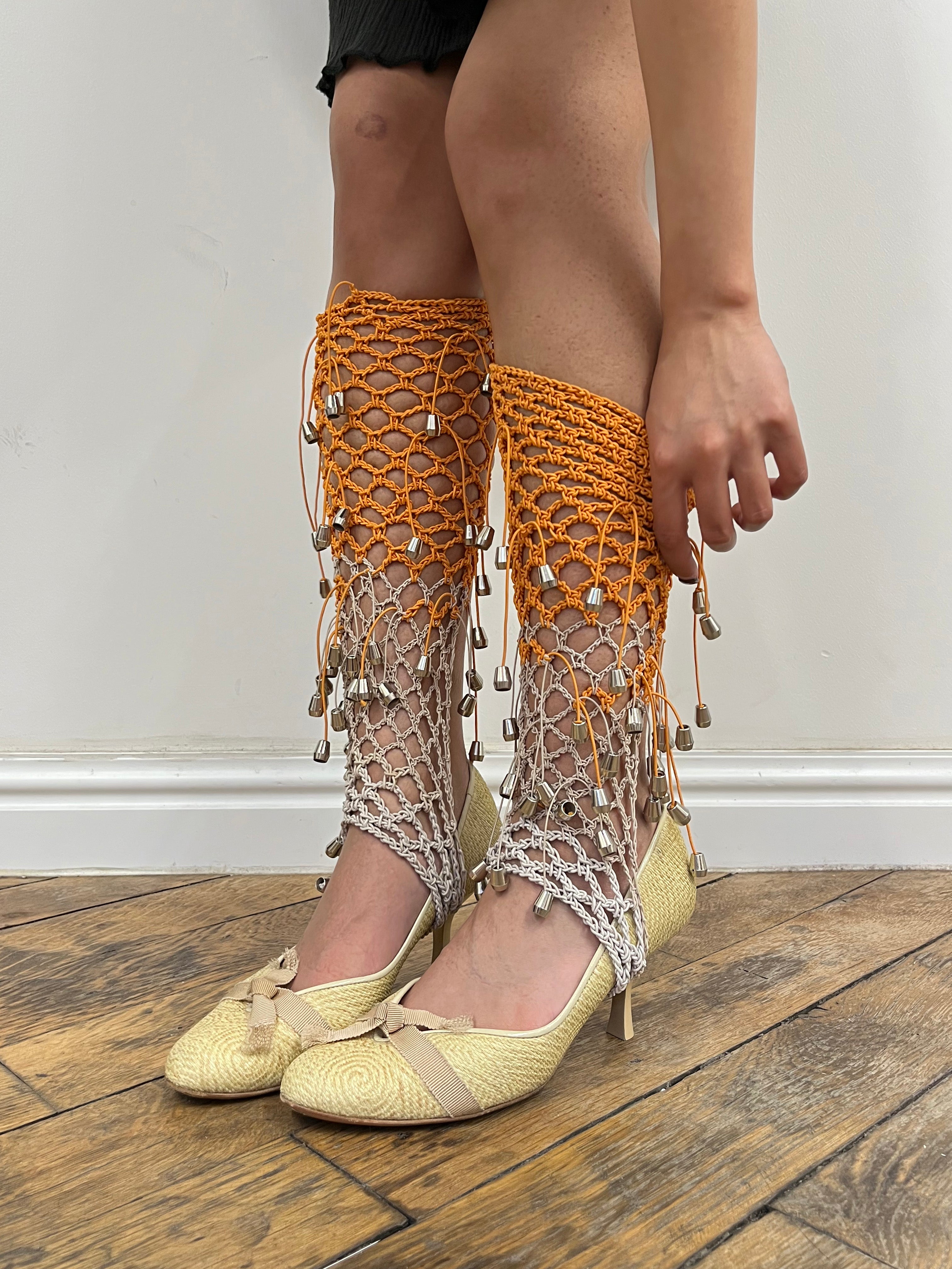 beige and orange crochet elastic stirrups