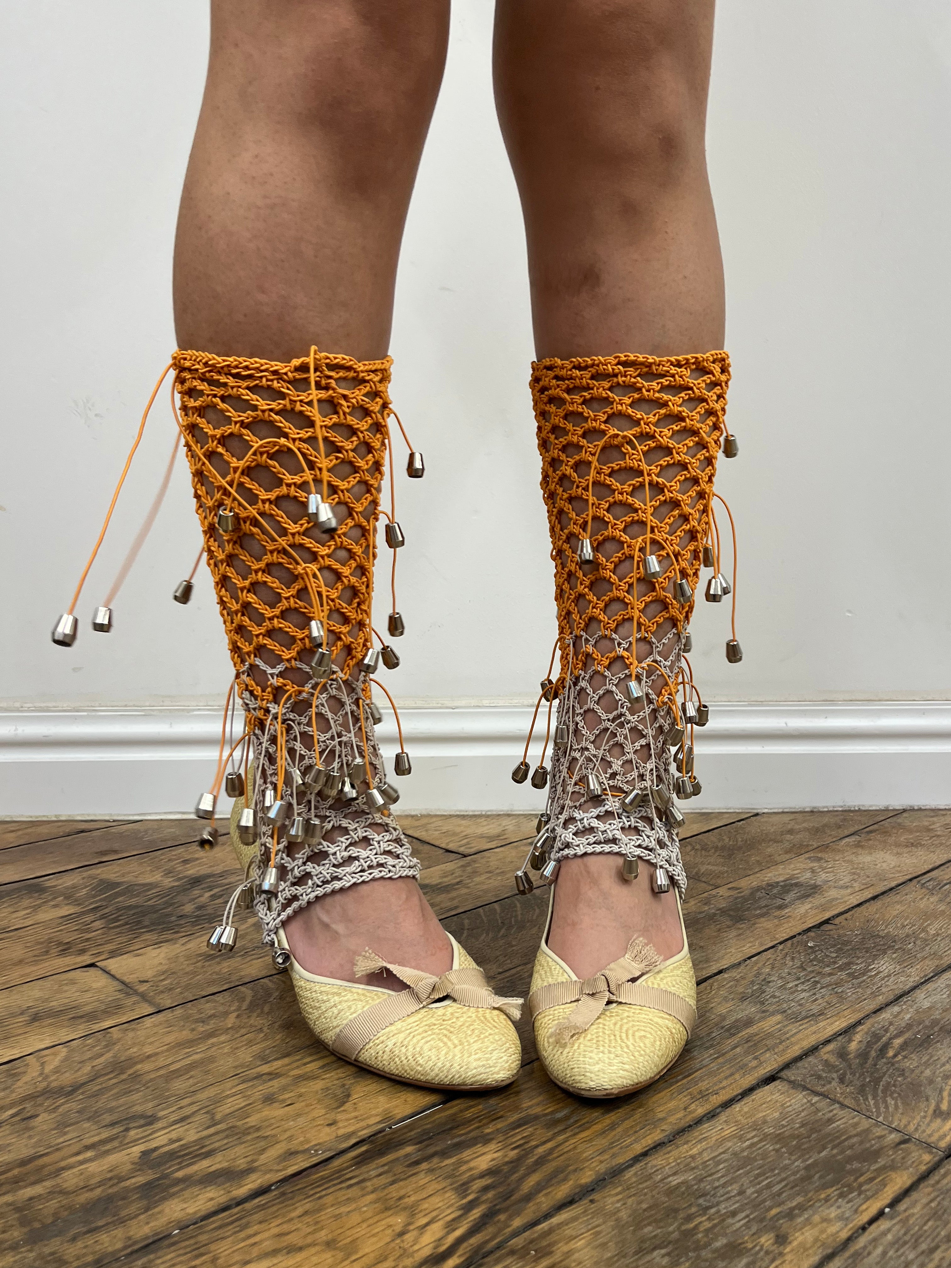 beige and orange crochet elastic stirrups