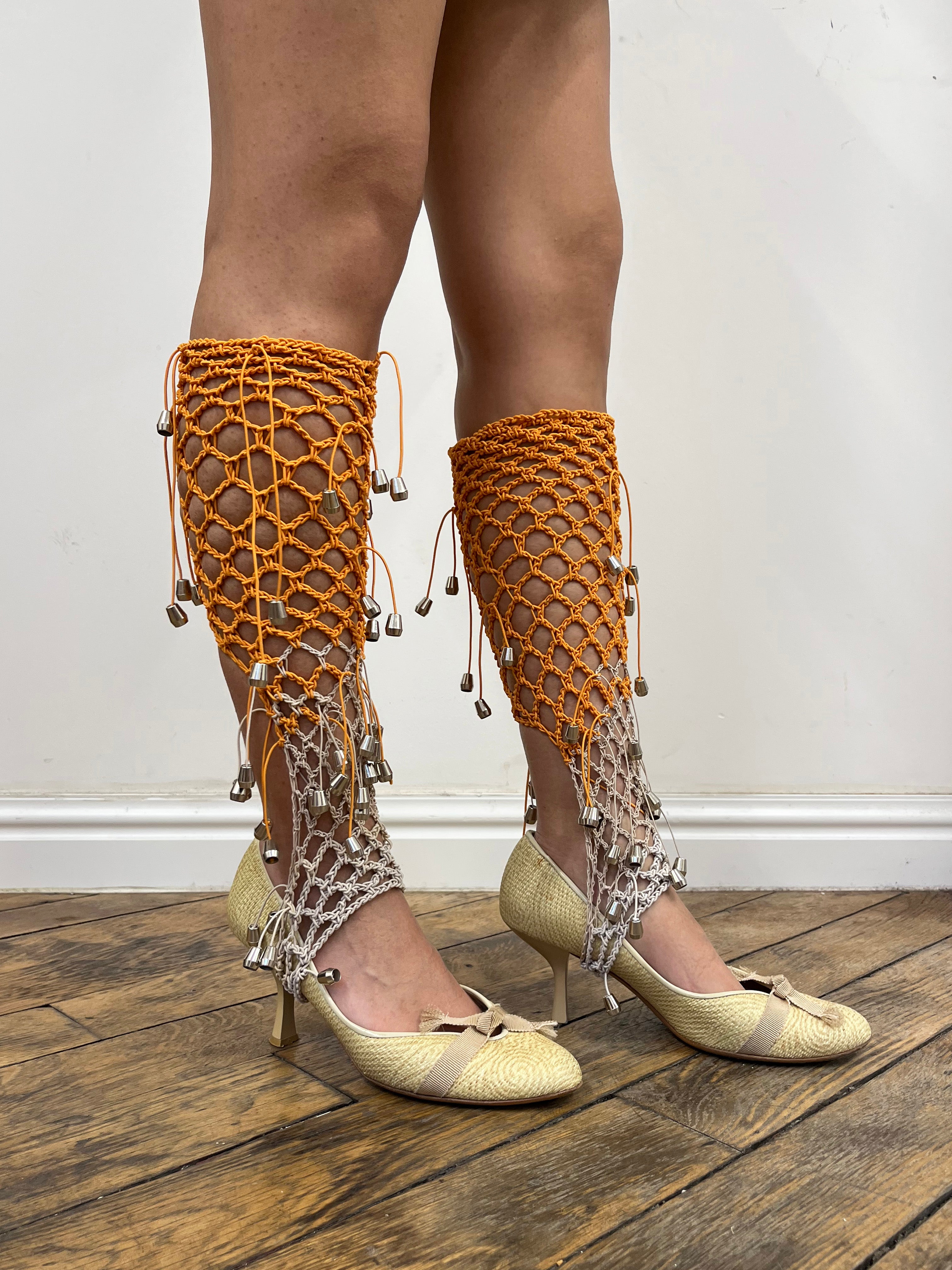 beige and orange crochet elastic stirrups
