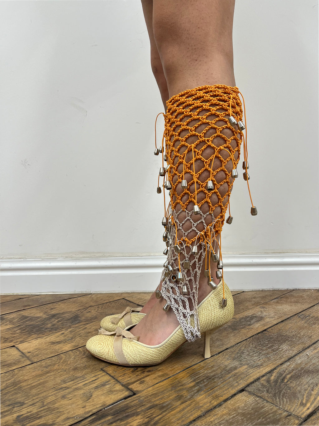 beige and orange crochet elastic stirrups