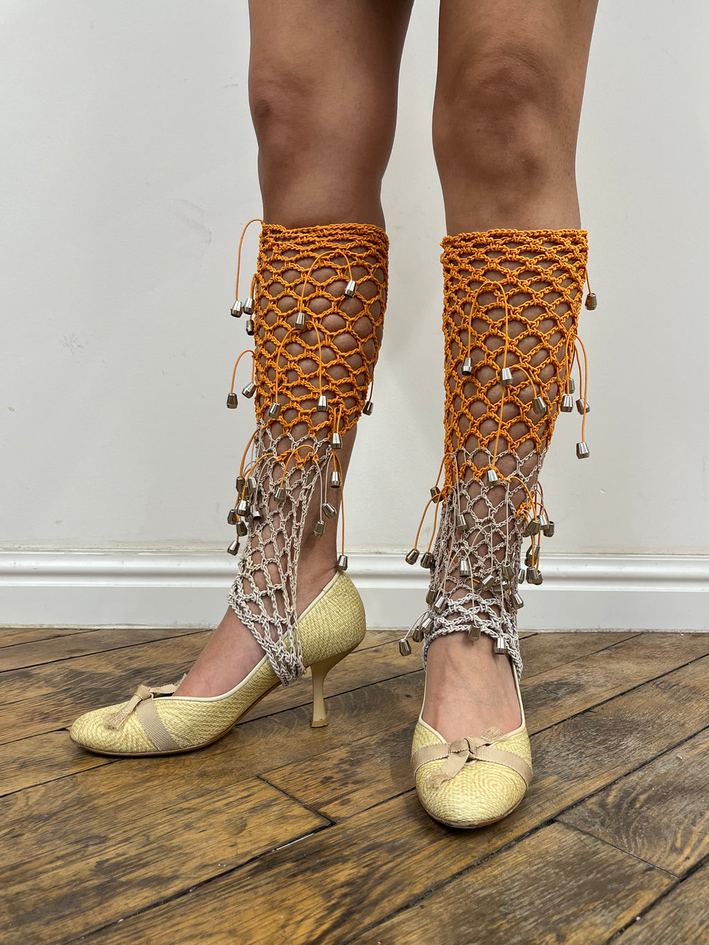 beige and orange crochet elastic stirrups