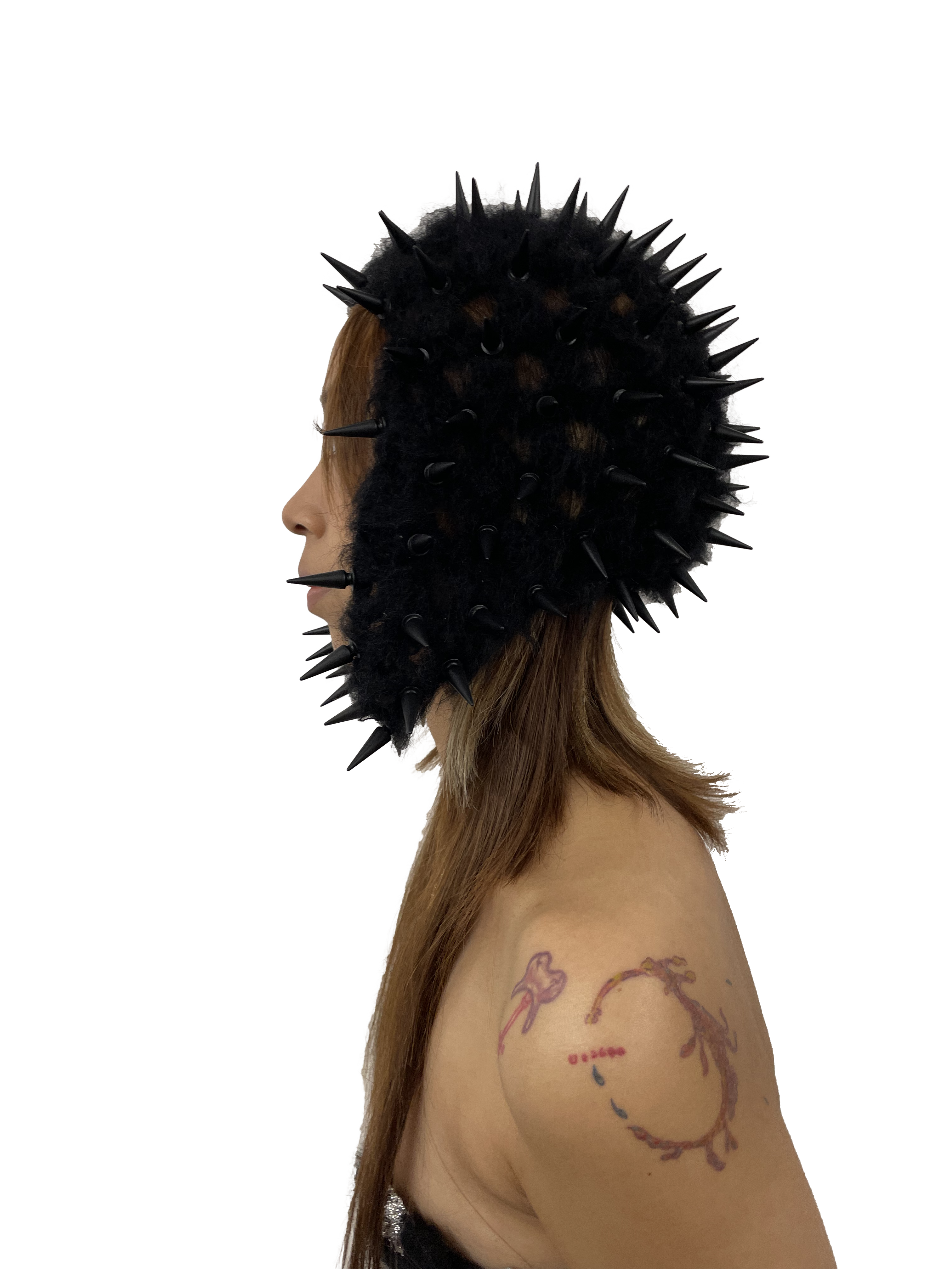 studded crochet headgear in technicolor black