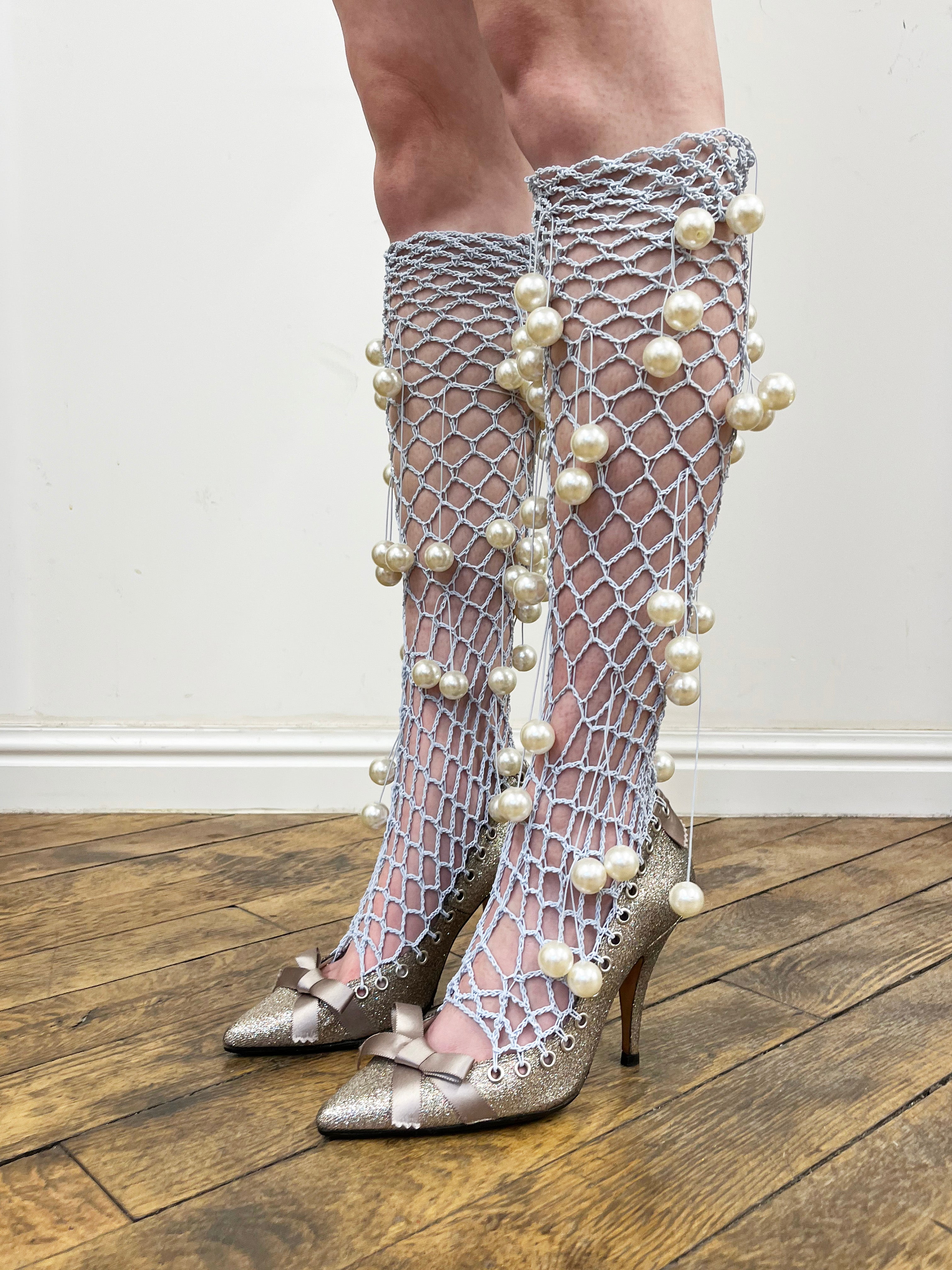 silver stilettos with with pearl hardware